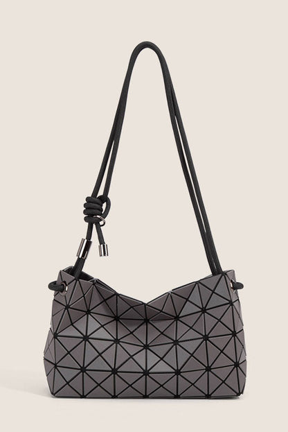 Ivory geometric shoulder bag with black strap