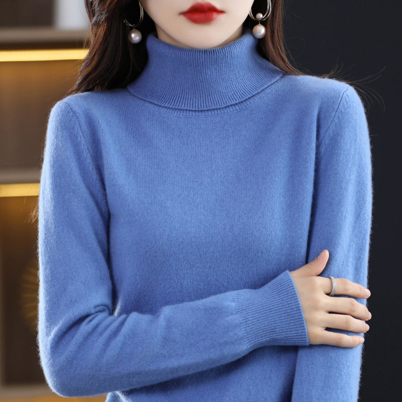 Woman wearing light blue cashmere turtleneck sweater