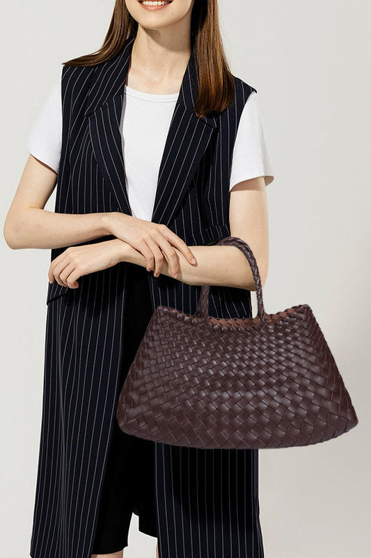 Front view of chocolate brown woven tote bag with braided handle