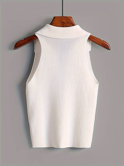 Woman in white ribbed halter top and denim shorts