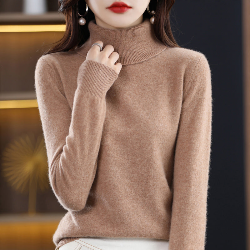 Woman wearing light blue cashmere turtleneck sweater
