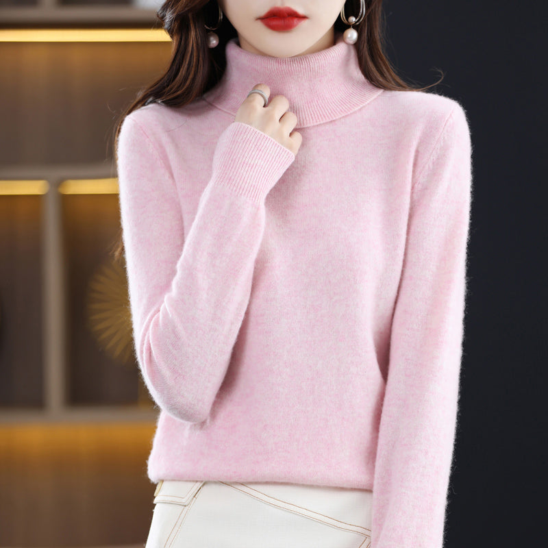 Woman wearing light blue cashmere turtleneck sweater