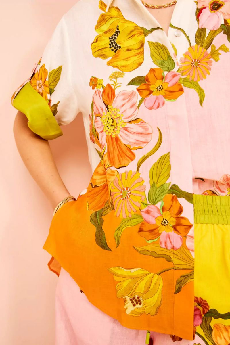 Woman in colorful floral linen pant set
