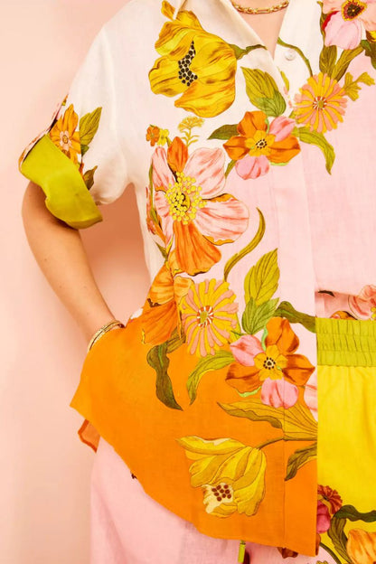 Woman in colorful floral linen pant set