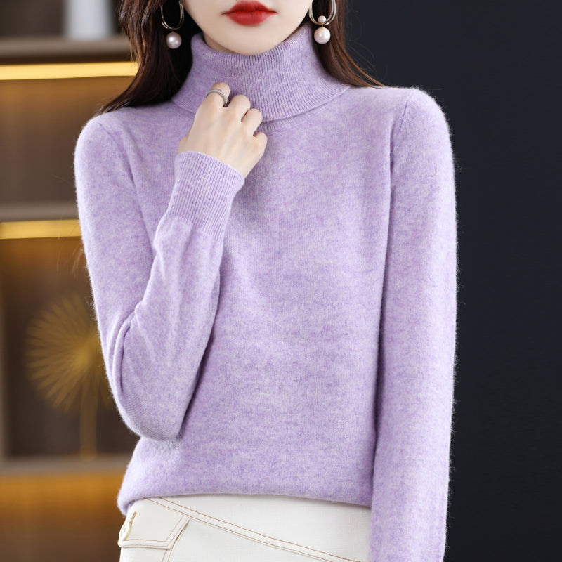 Woman wearing light blue cashmere turtleneck sweater