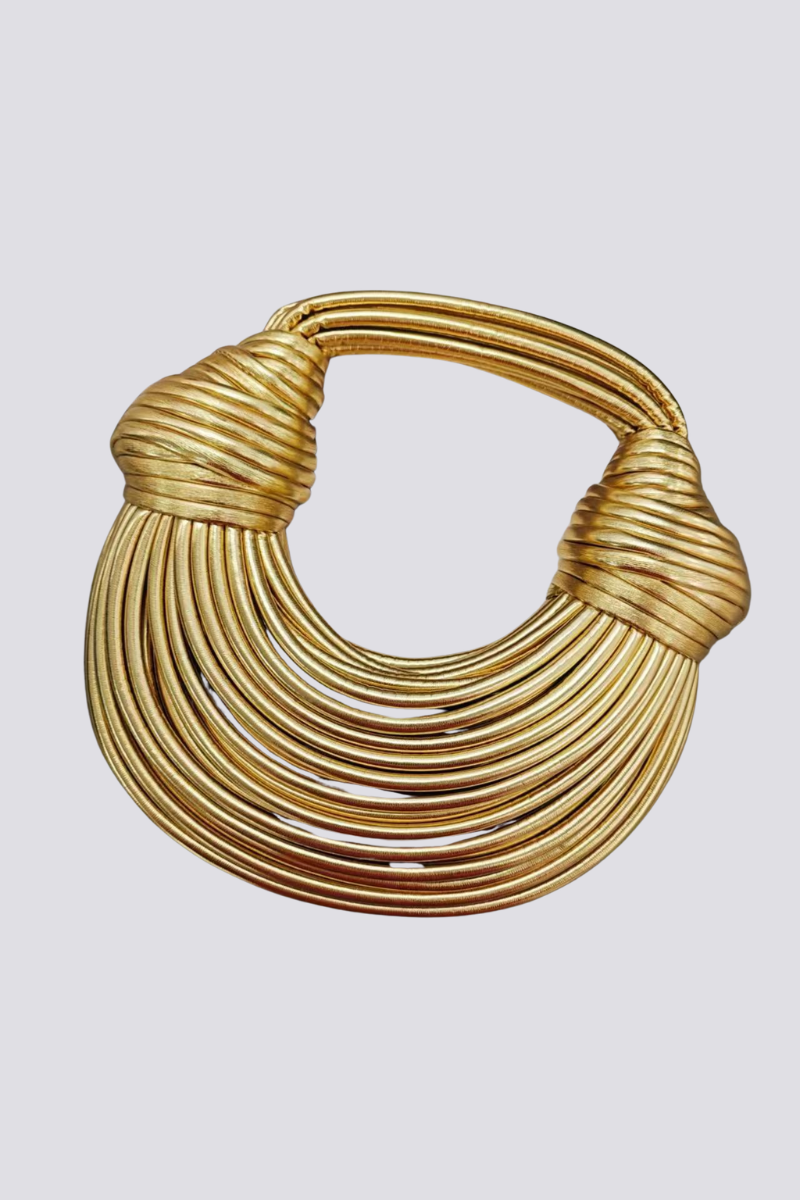 Gold rope handle bag with sculptural design