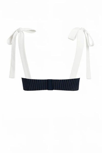 Woman in blue and white striped two-piece set
