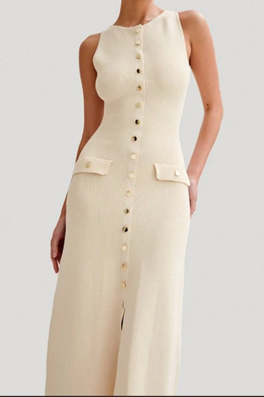 Woman in cream ribbed knit midi dress with buttons