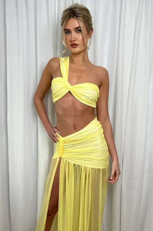 Woman in yellow sheer mesh two-piece set