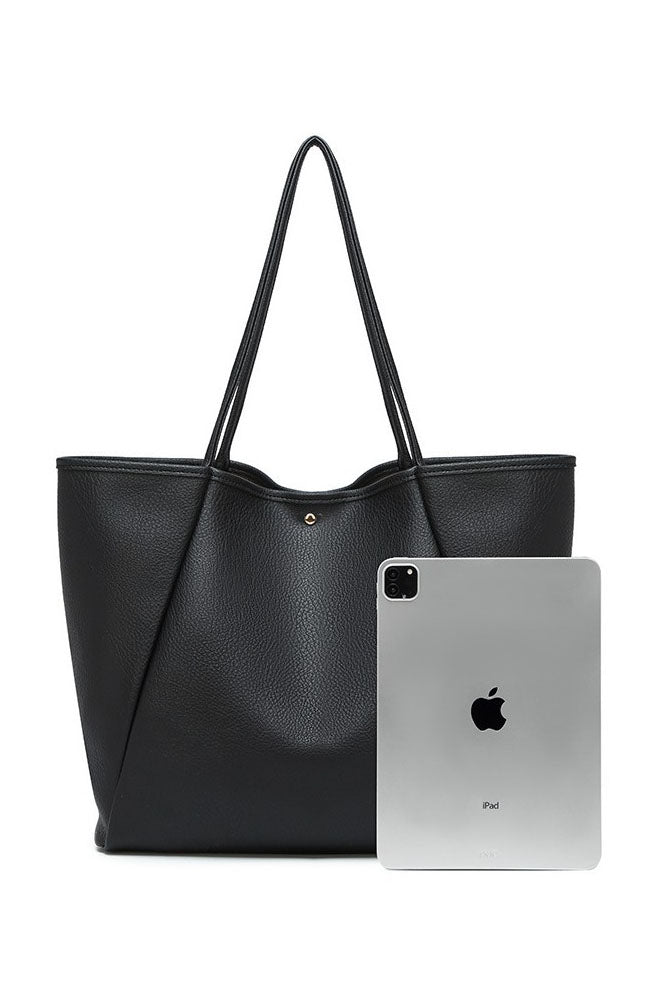 Black faux leather tote bag with shoulder straps