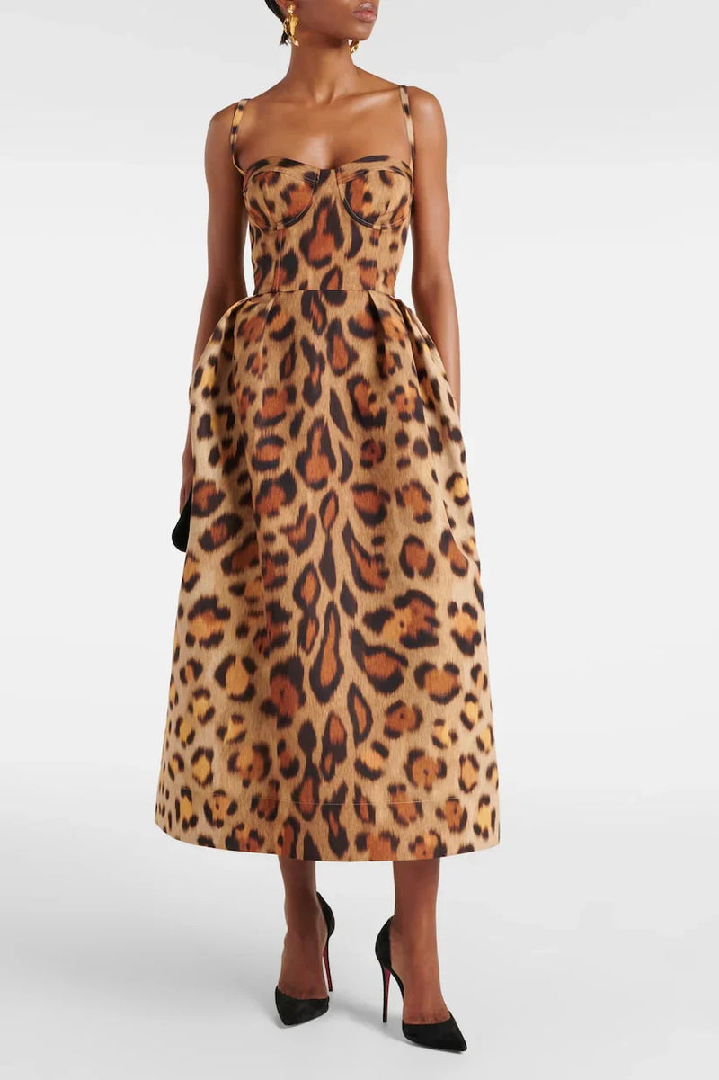 Woman wearing leopard print bustier midi dress