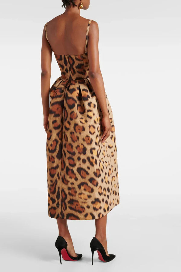 Woman wearing leopard print bustier midi dress