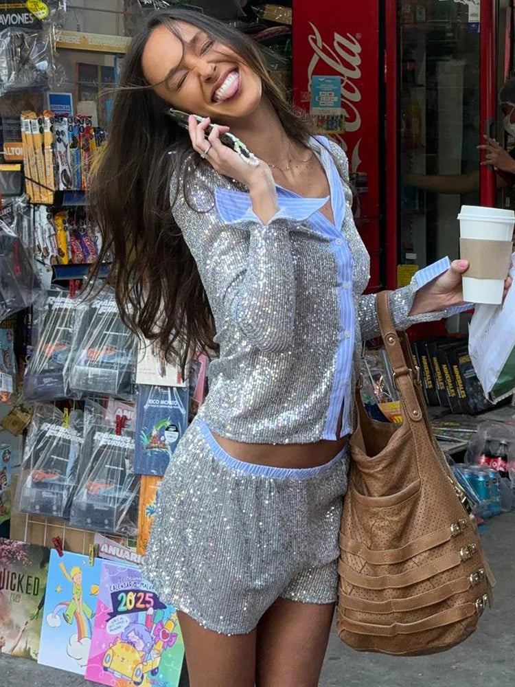 Woman wearing sequin pajama set.