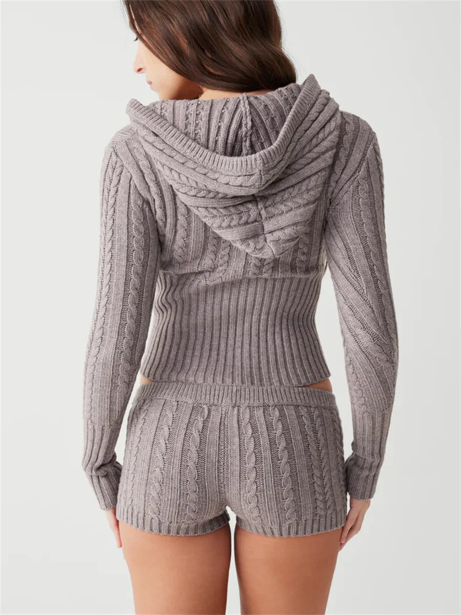 Woman wearing gray knit hoodie and shorts set