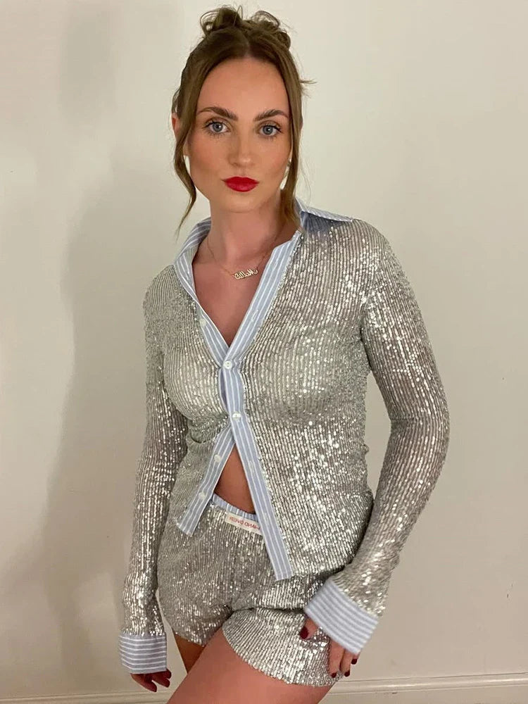 Woman wearing sequin pajama set.
