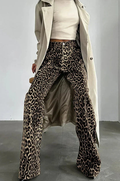Woman wearing leopard print wide leg jeans and beige trench coat