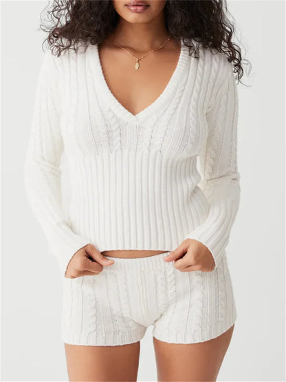 Woman wearing gray knit hoodie and shorts set