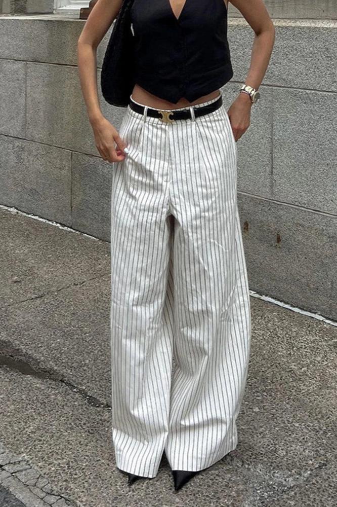 Woman wearing white and gray striped linen wide-leg pants