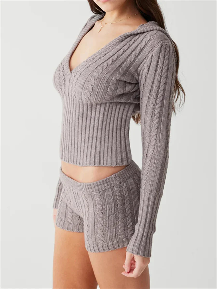 Woman wearing gray knit hoodie and shorts set