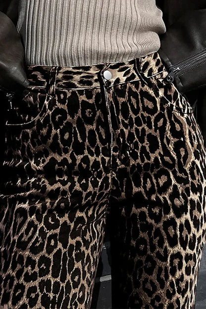 Woman wearing leopard print wide leg jeans and beige trench coat