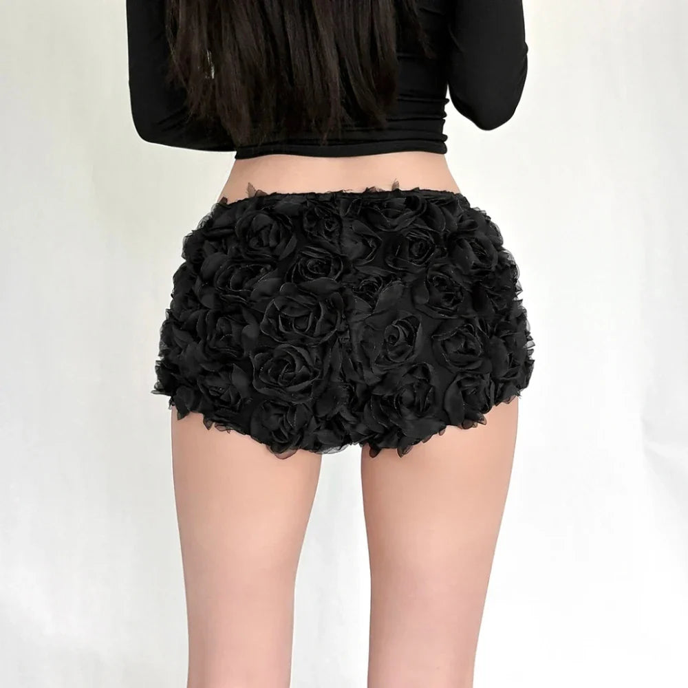 Woman wearing red rose applique shorts