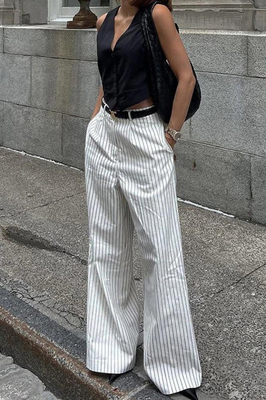 Woman wearing white and gray striped linen wide-leg pants