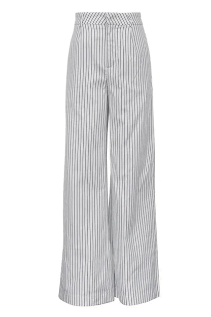 Woman wearing white and gray striped linen wide-leg pants