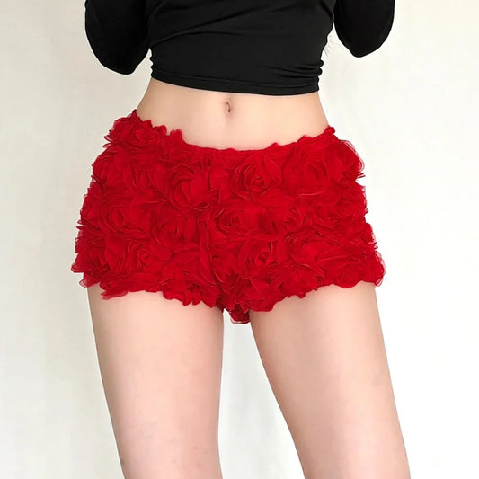 Woman wearing red rose applique shorts