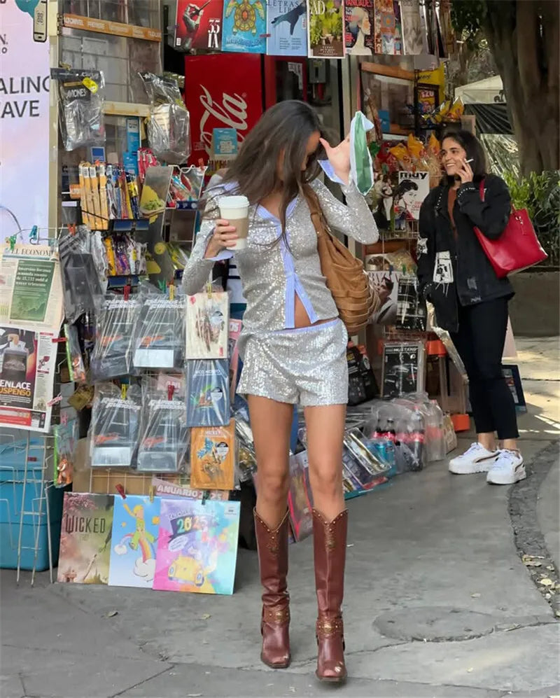 Woman wearing sequin pajama set.