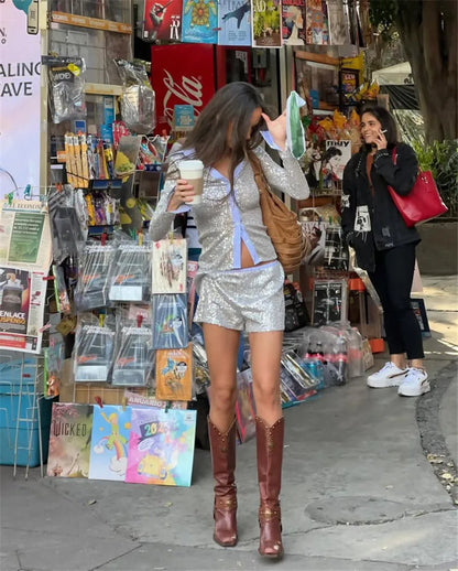 Woman wearing sequin pajama set.