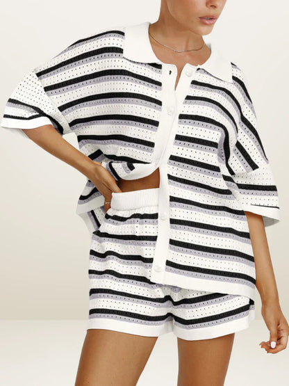 Woman in pink and yellow striped knit cardigan and shorts set sitting by pool.