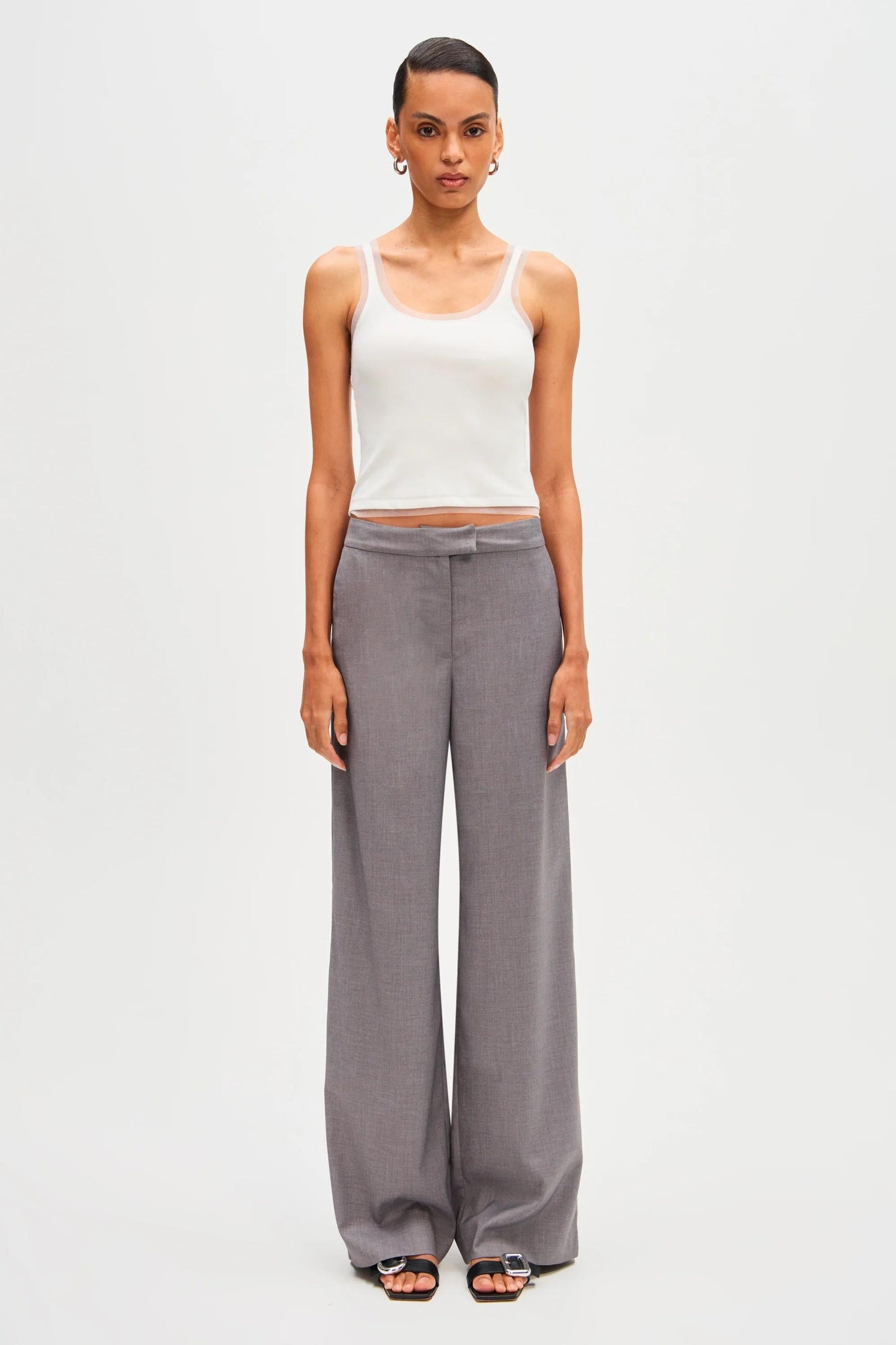 Woman in gray wool blend pant suit