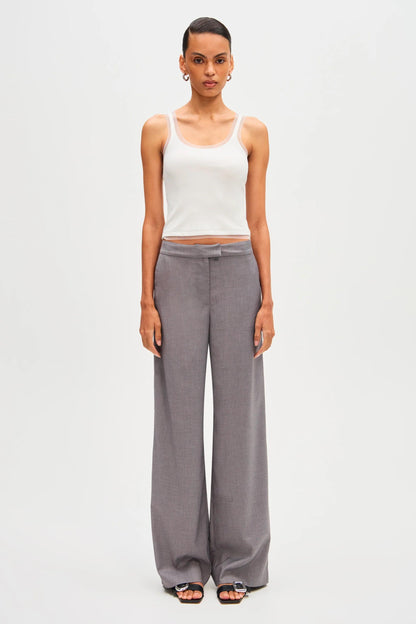 Woman in gray wool blend pant suit