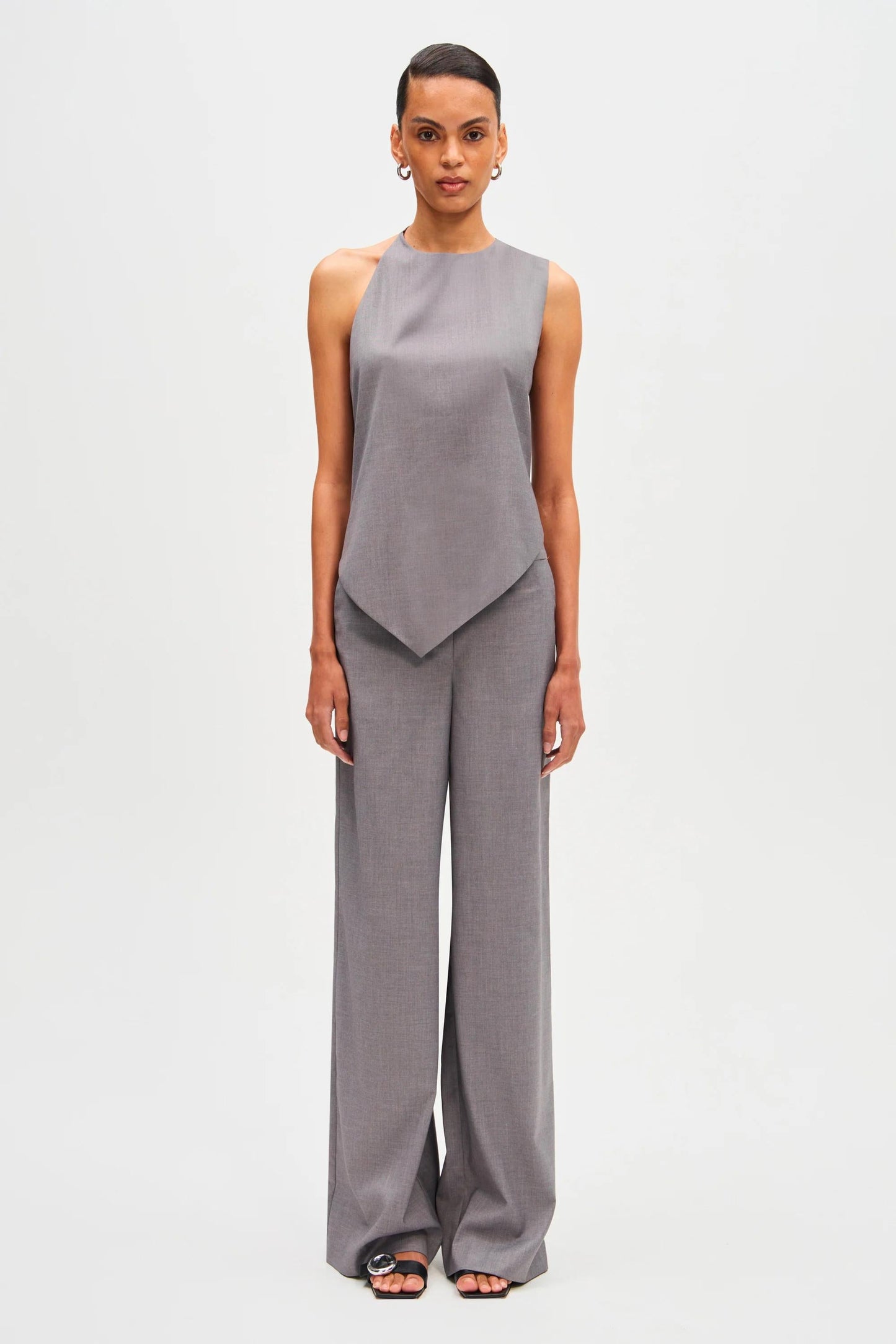 Woman in gray wool blend pant suit