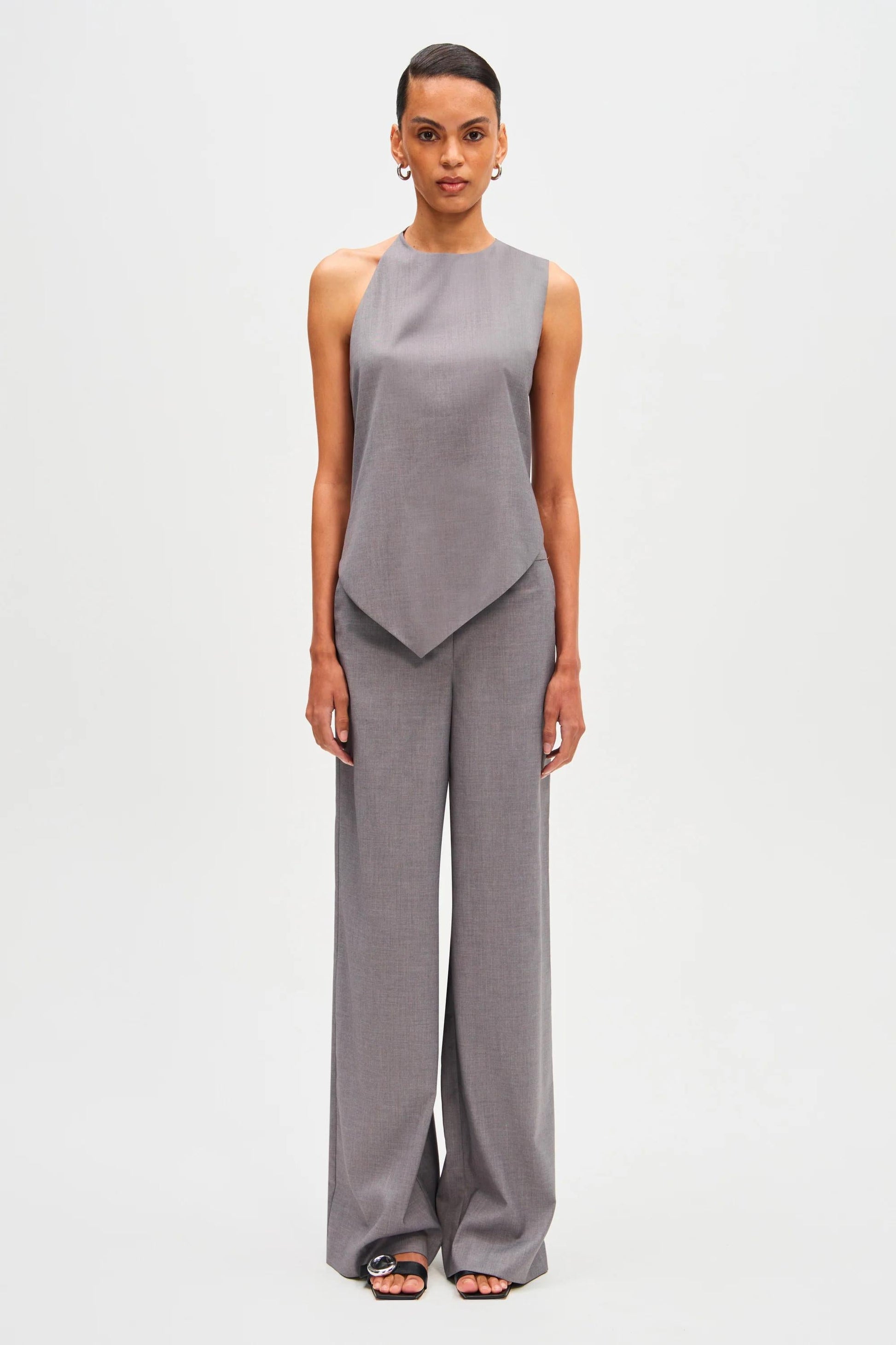 Woman in gray wool blend pant suit
