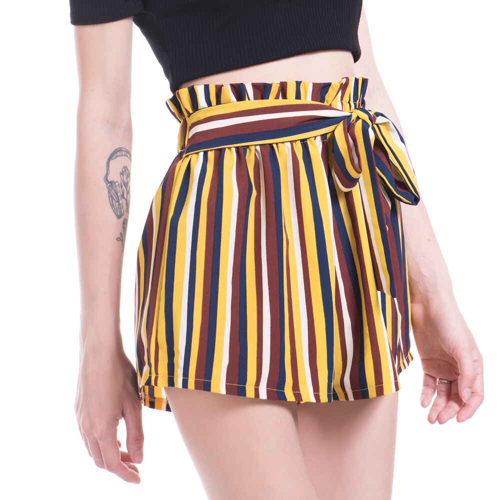 Woman wearing striped paperbag waist shorts