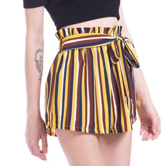 Woman wearing striped paperbag waist shorts