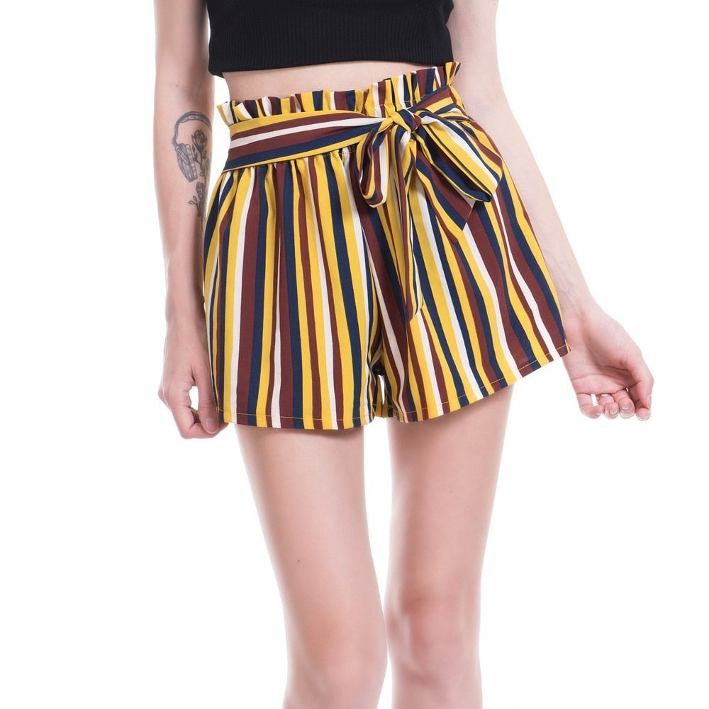 Woman wearing striped paperbag waist shorts