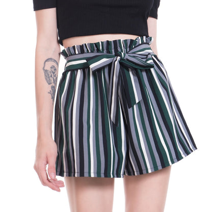 Woman wearing striped paperbag waist shorts