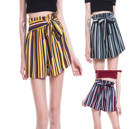 Woman wearing striped paperbag waist shorts