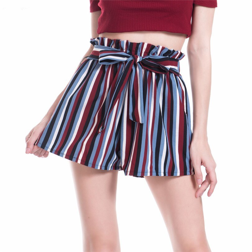 Woman wearing striped paperbag waist shorts