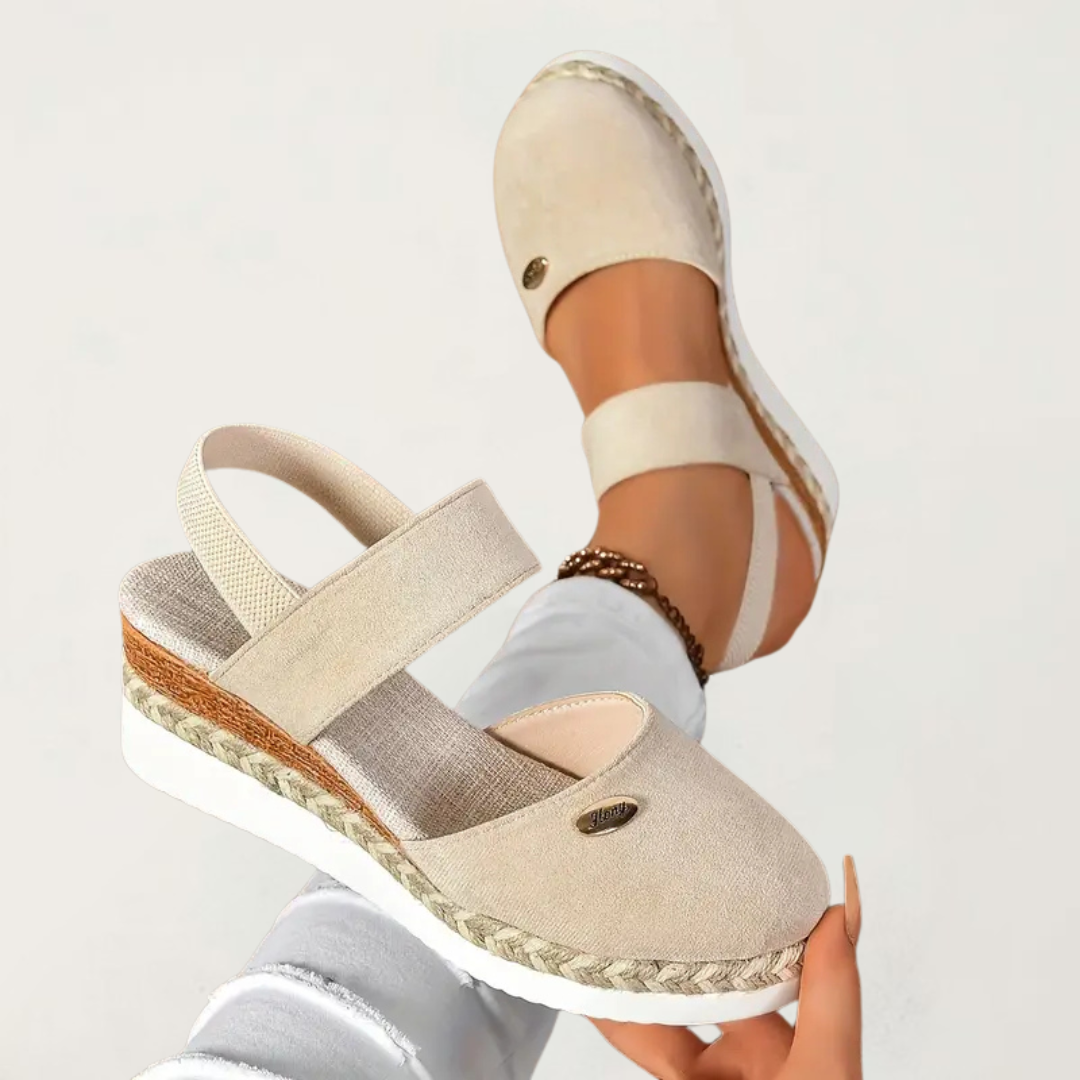 Beige - Women's canvas closed-toe platform sandals featuring an elastic slingback strap, layered cork and braided-jute midsole, and a white rubber traction outsole.