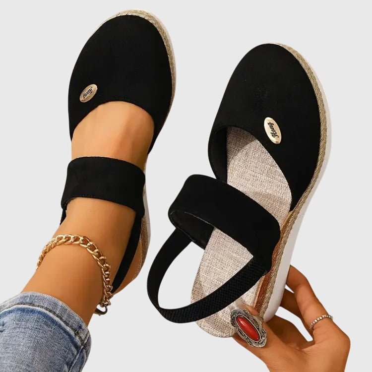 Black - Women's canvas closed-toe platform sandals featuring an elastic slingback strap, layered cork and braided-jute midsole, and a white rubber traction outsole.