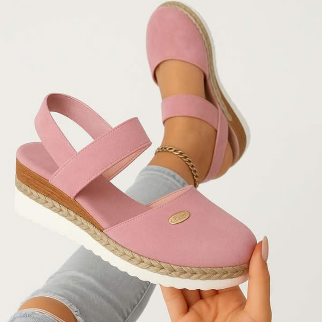 Pink - Women's canvas closed-toe platform sandals featuring an elastic slingback strap, layered cork and braided-jute midsole, and a white rubber traction outsole.
