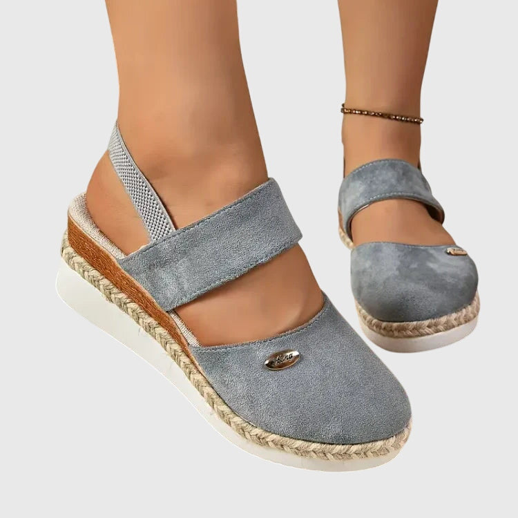 Gray - Women's canvas closed-toe platform sandals featuring an elastic slingback strap, layered cork and braided-jute midsole, and a white rubber traction outsole.