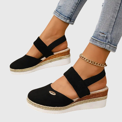 Gray - Women's canvas closed-toe platform sandals featuring an elastic slingback strap, layered cork and braided-jute midsole, and a white rubber traction outsole.