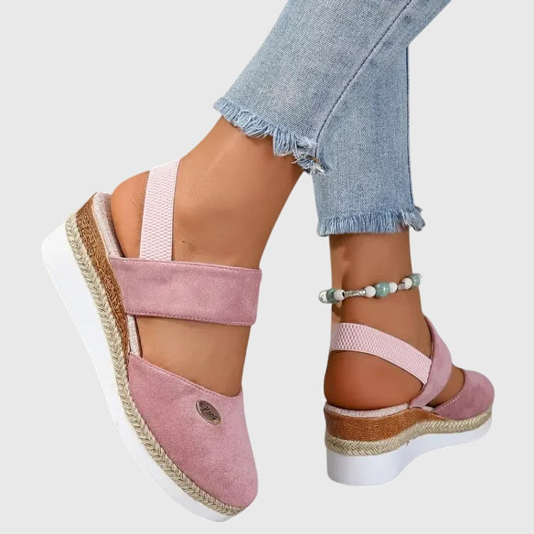 Blue - Women's canvas closed-toe platform sandals featuring an elastic slingback strap, layered cork and braided-jute midsole, and a white rubber traction outsole.