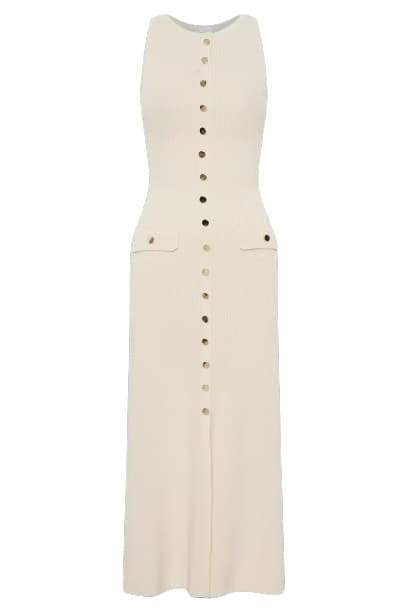 Woman wearing cream ribbed knit maxi dress with buttons