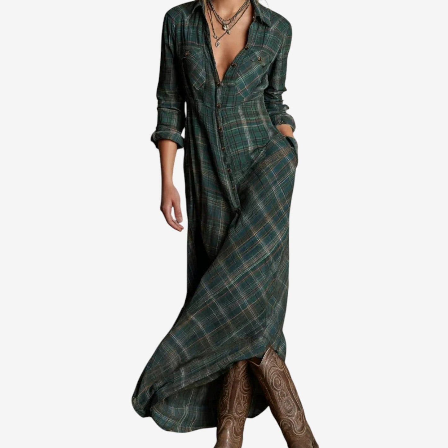 Green - A woman wearing a green plaid long-sleeve maxi shirt dress with a button-down front, styled with brown leather cowboy boots.