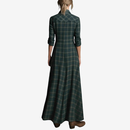 Green - A woman wearing a green plaid long-sleeve maxi shirt dress with a button-down front, styled with brown leather cowboy boots.